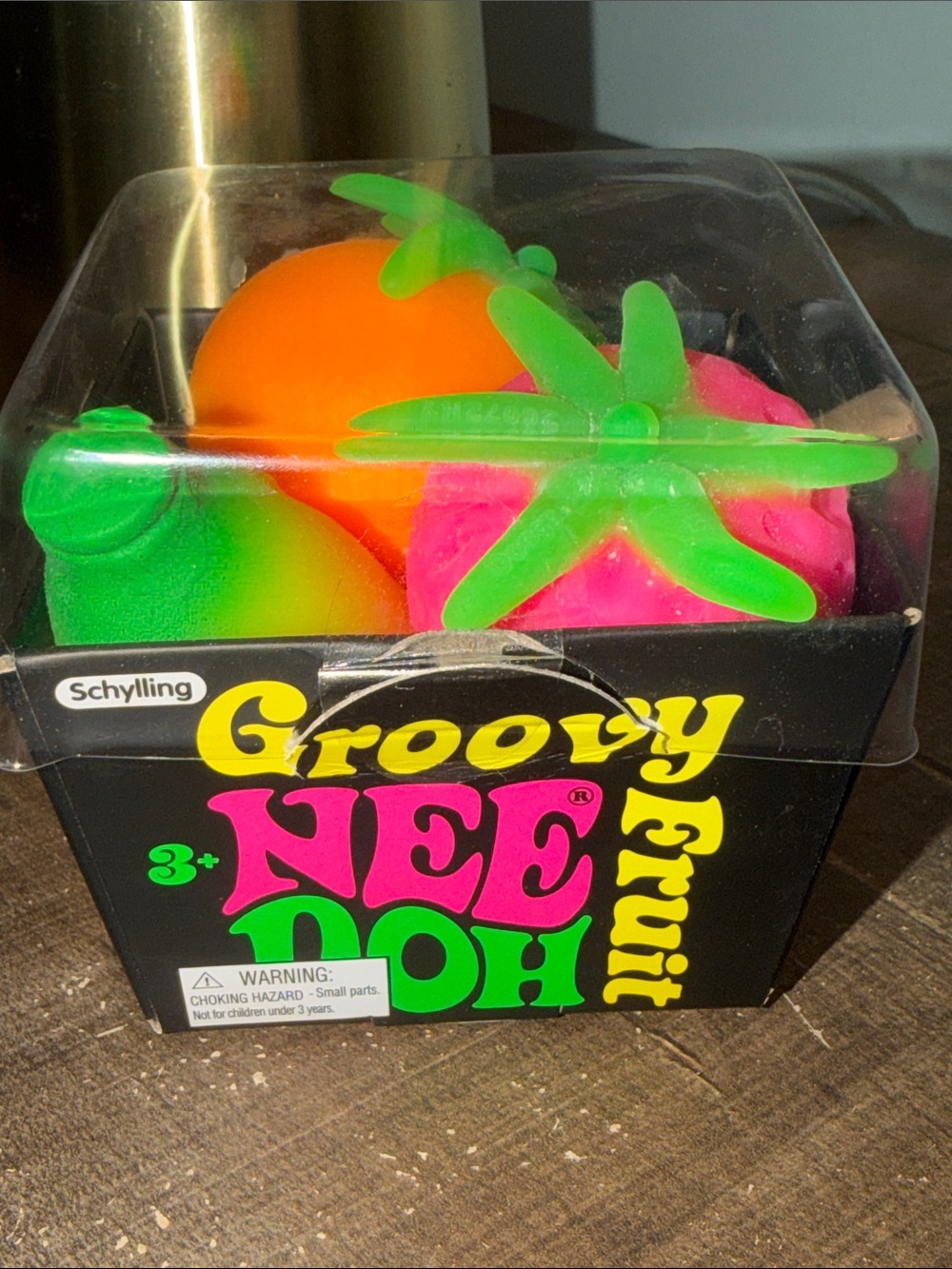 NEEDOH Groovy Fruit - banana, strawberry, and orange.